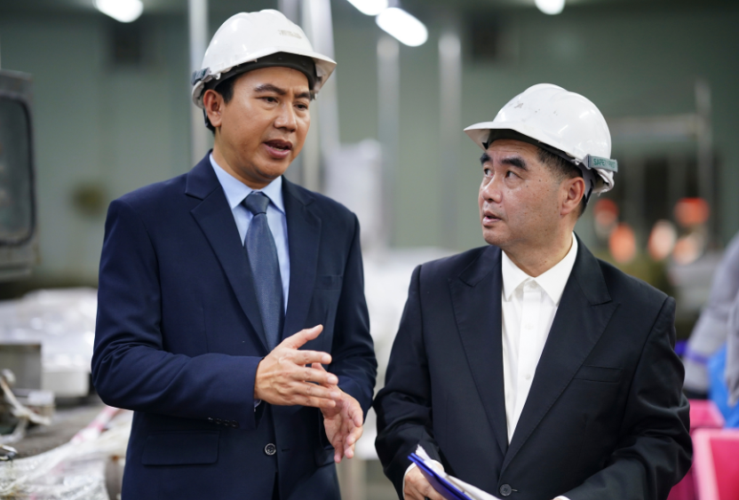 Server rack with colorful fiber optic cables connected to ports.