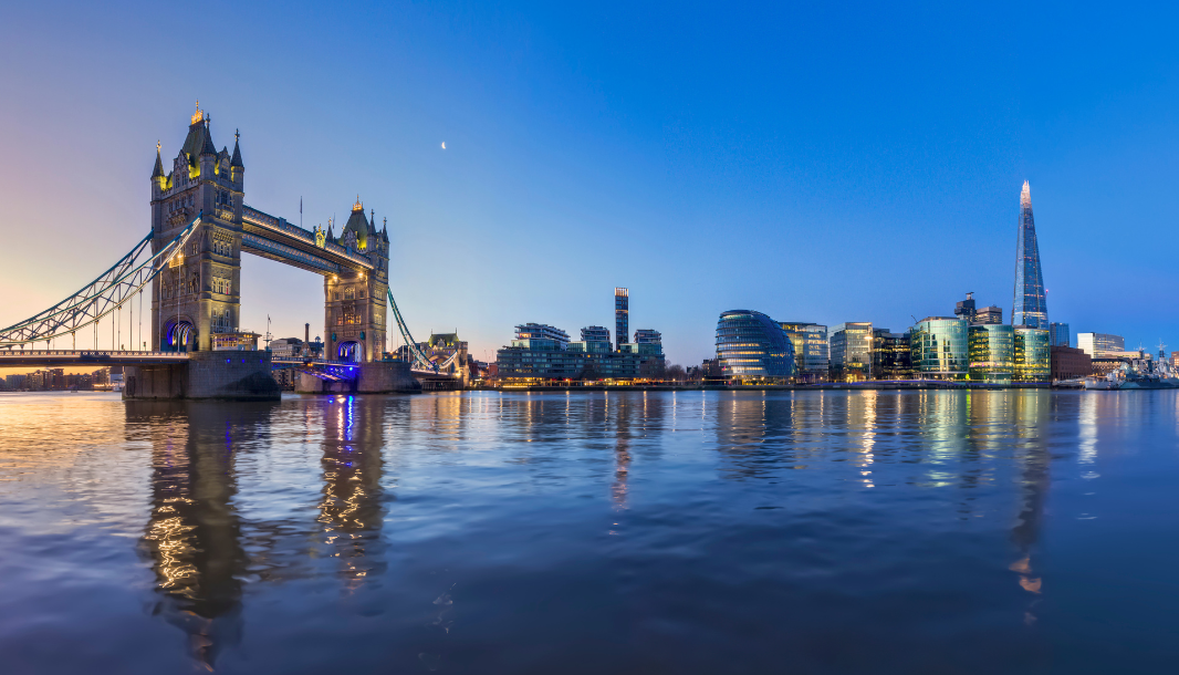 Server rack with colorful fiber optic cables connected to ports.