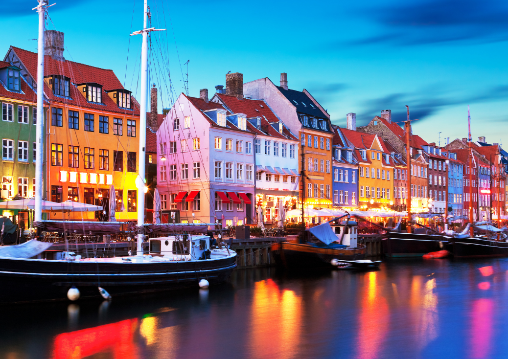 Server rack with colorful fiber optic cables connected to ports.