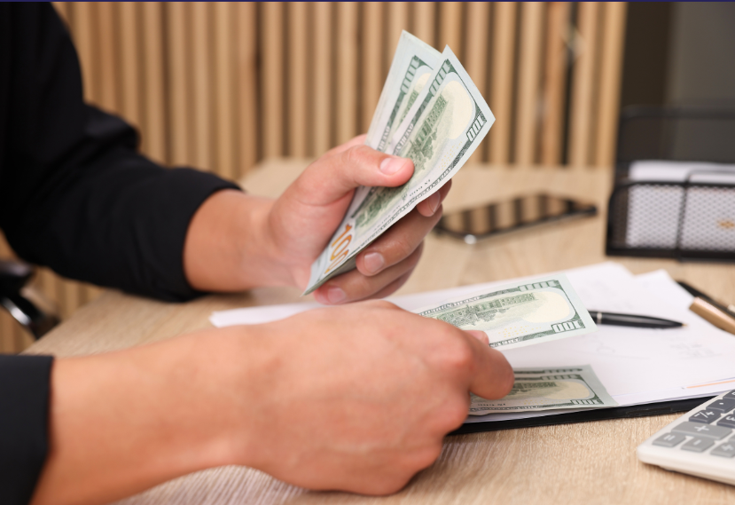 Server rack with colorful fiber optic cables connected to ports.