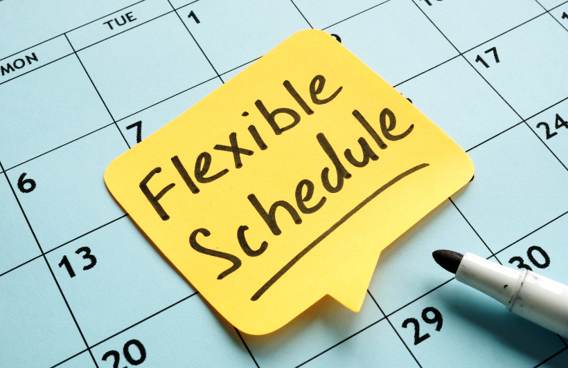 Server rack with colorful fiber optic cables connected to ports.