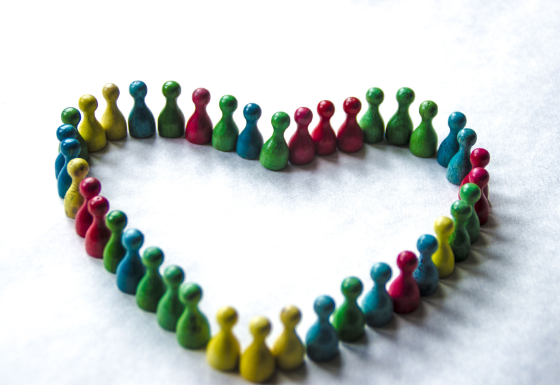 Server rack with colorful fiber optic cables connected to ports.