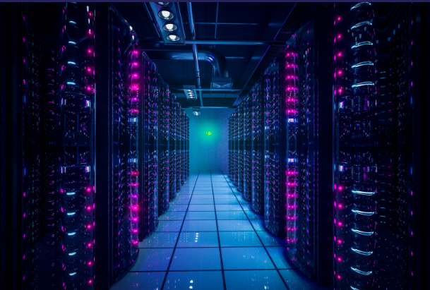 Server rack with colorful fiber optic cables connected to ports.