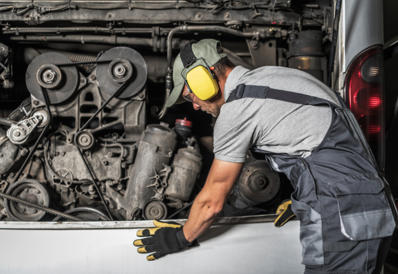 women wearing a hard hat looking out
