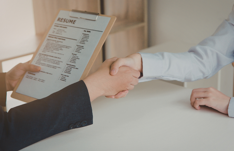 Server rack with colorful fiber optic cables connected to ports.