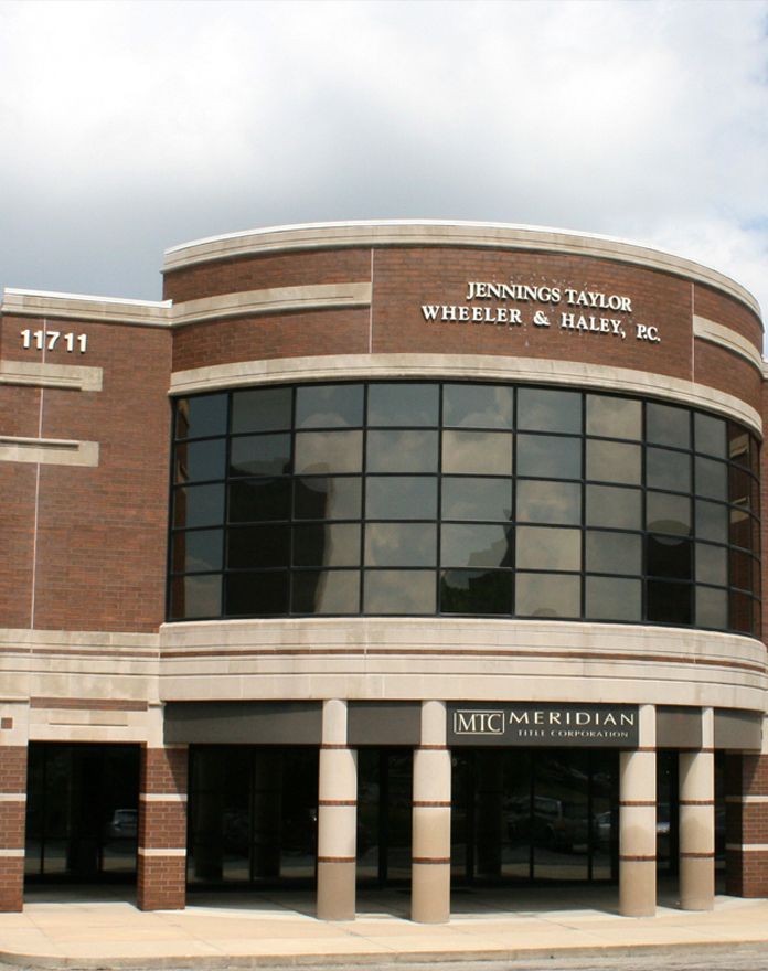 A brick building with the name jennifer taylor on it