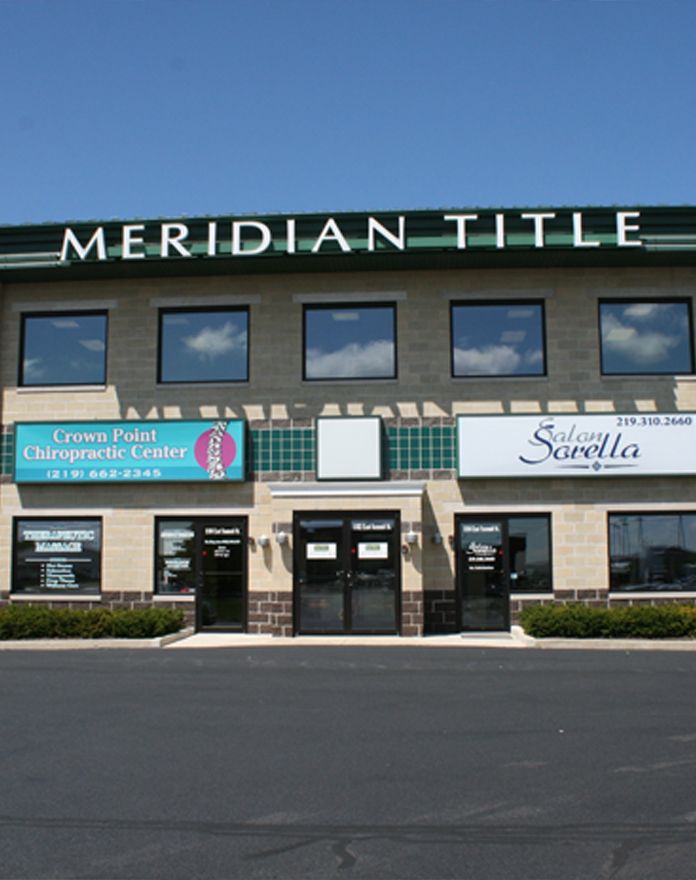 A building with a sign that says meridian title