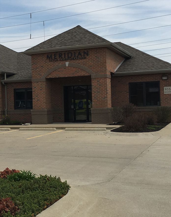 A brick building with the word meridian on it