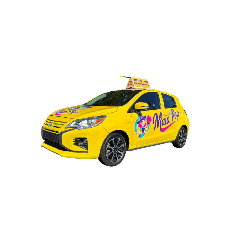 Yellow car with MaidPro branding and rooftop sign Yellow car with MaidPro branding and rooftop sign