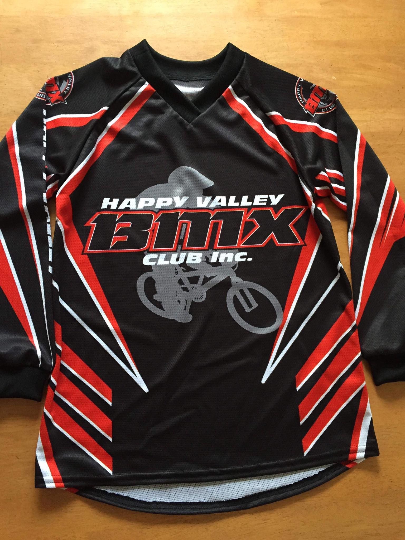 A black and red shirt that says happy valley bmx club inc.