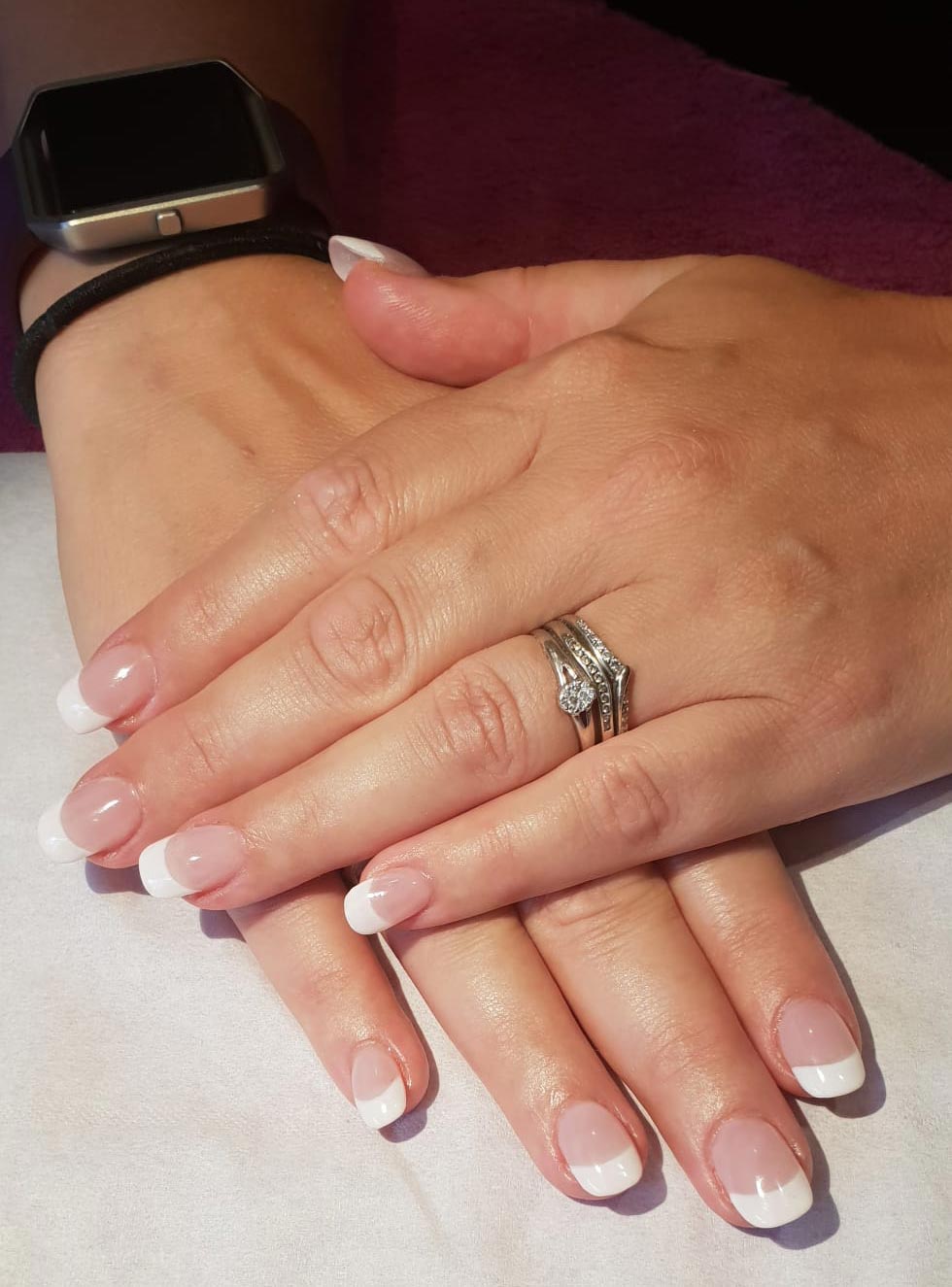 hands showing off french tips