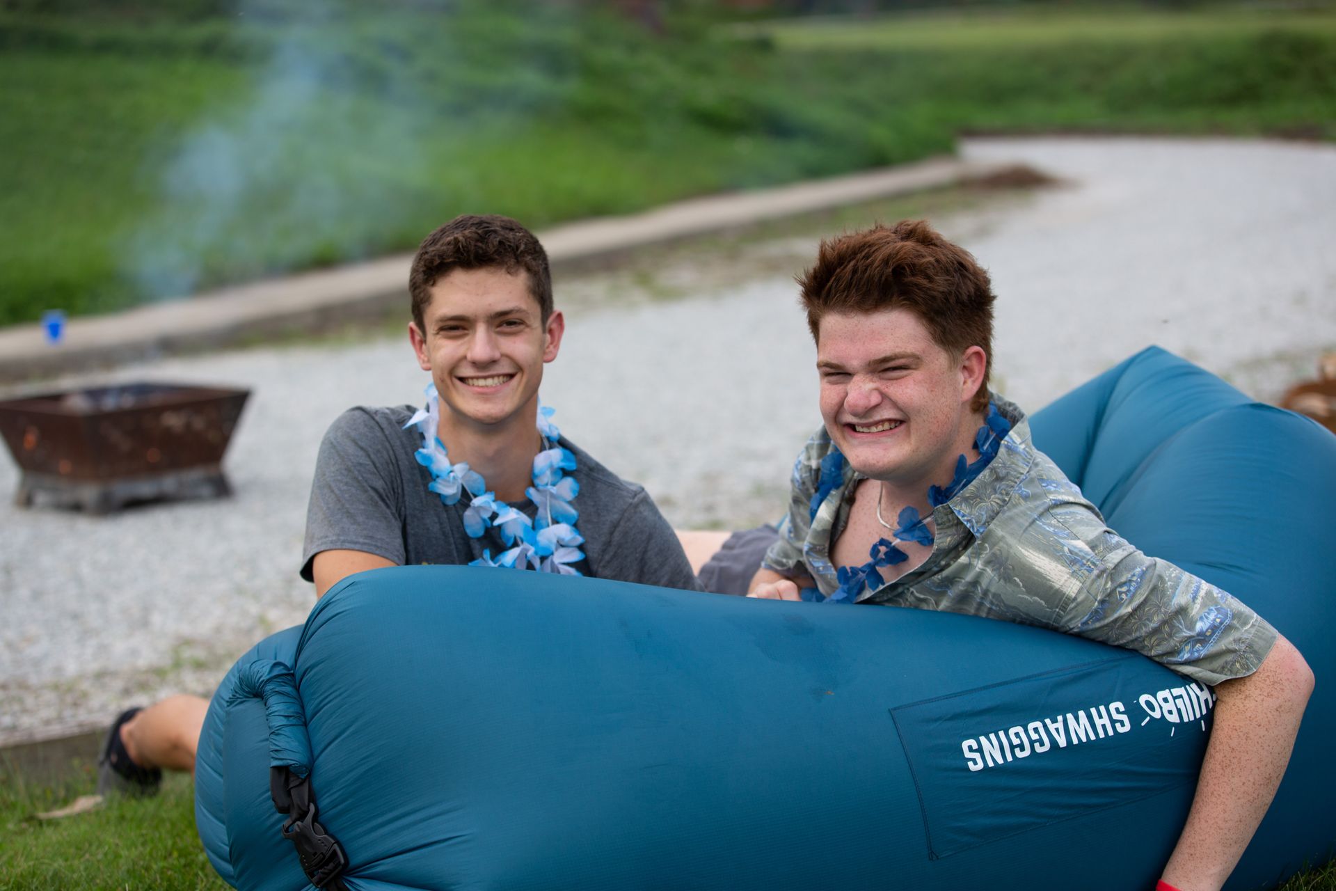 a man is giving a presentation to a group of people in a room .