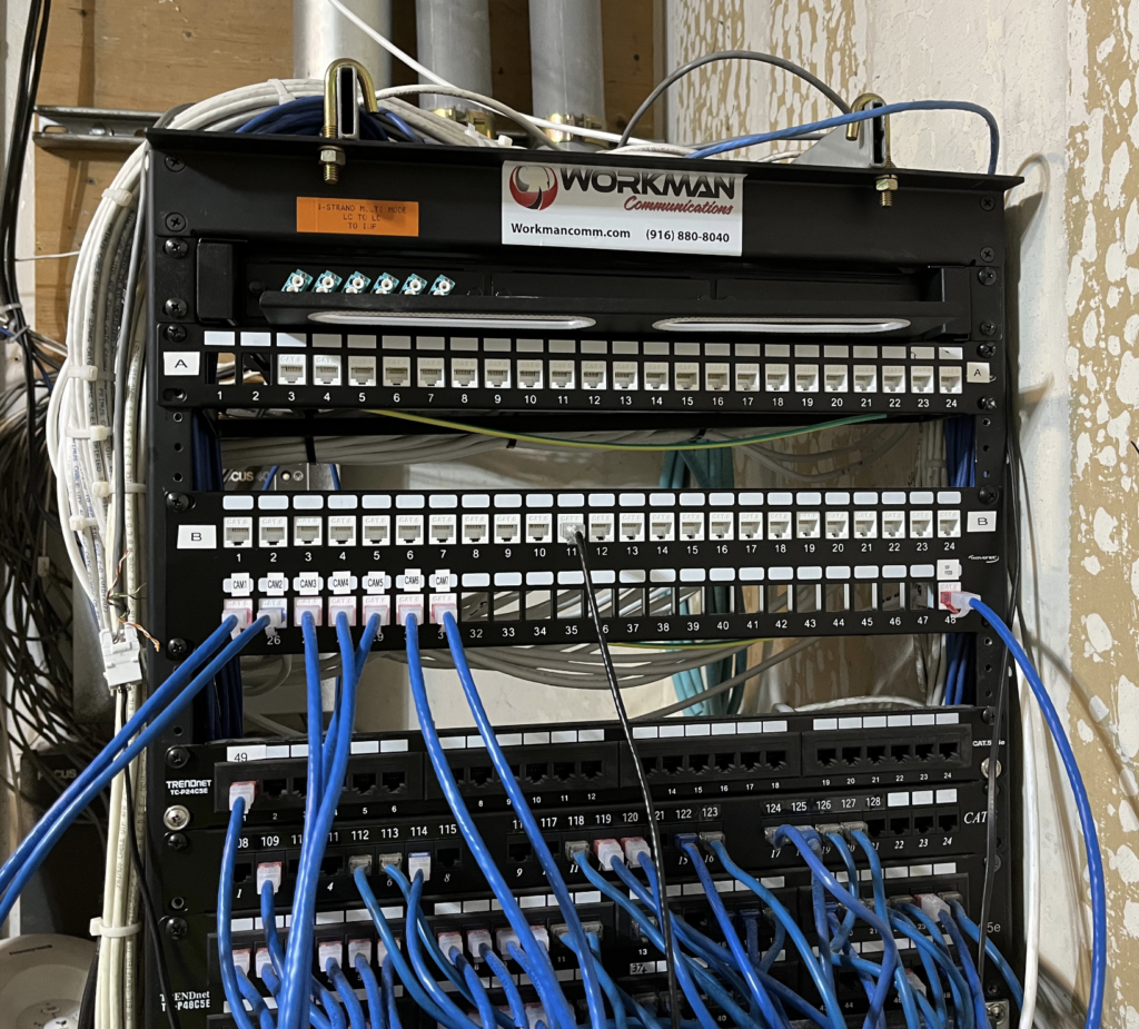 A server rack with a label that says workman on it