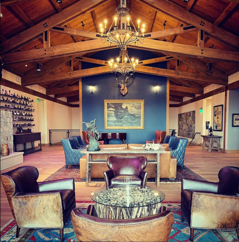 A living room filled with furniture and a chandelier