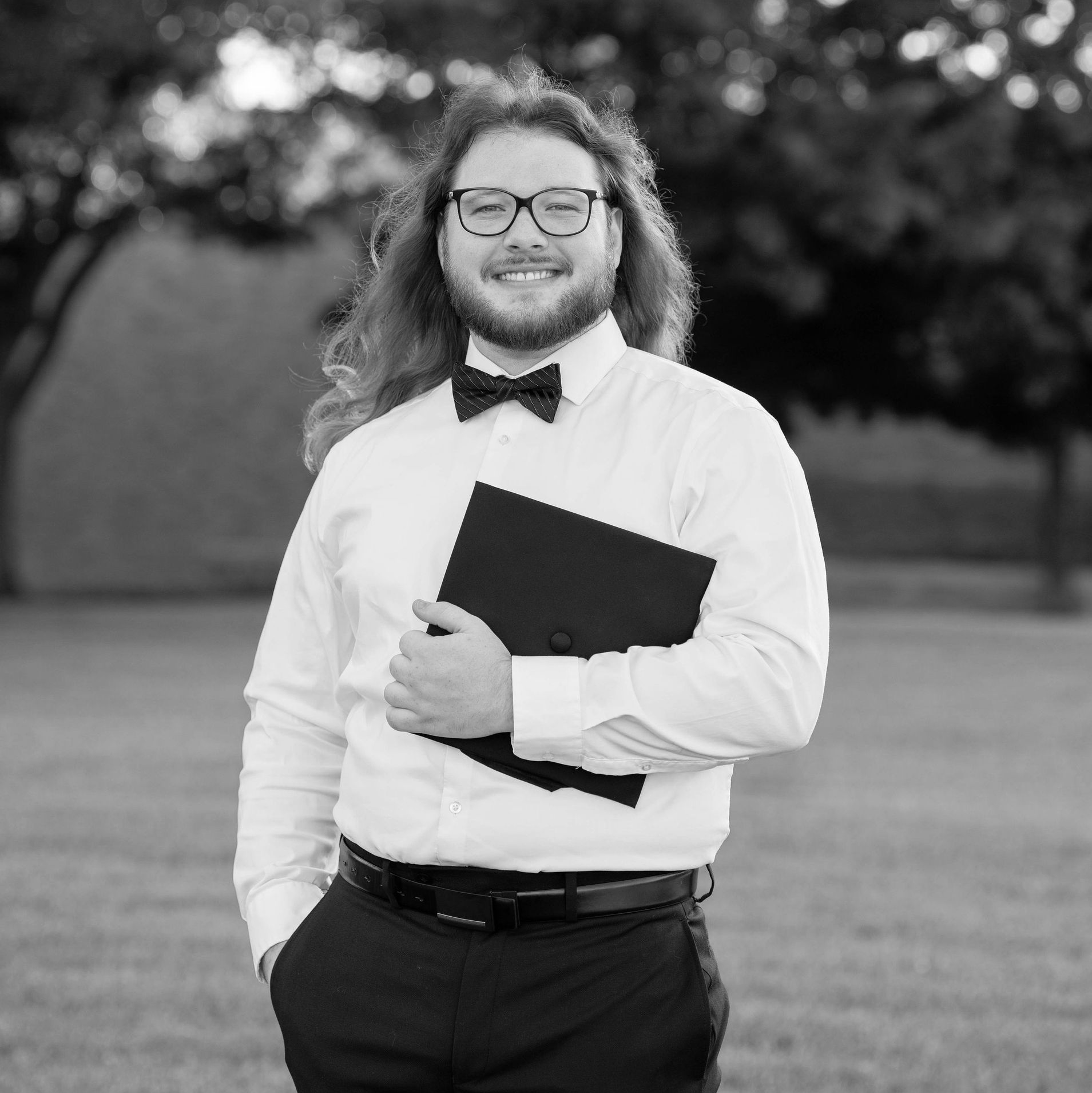black and white image of Austin Britten, LPC-Associate