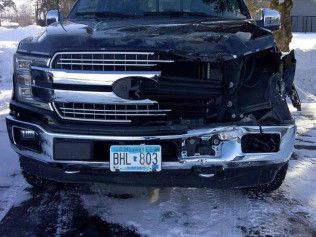 A Broken Black Truck | Faribault, MN | Midwest Collision
