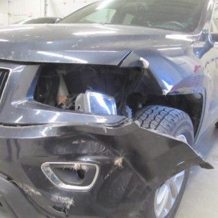 Car With A Damaged Front End | Faribault, MN | Midwest Collision