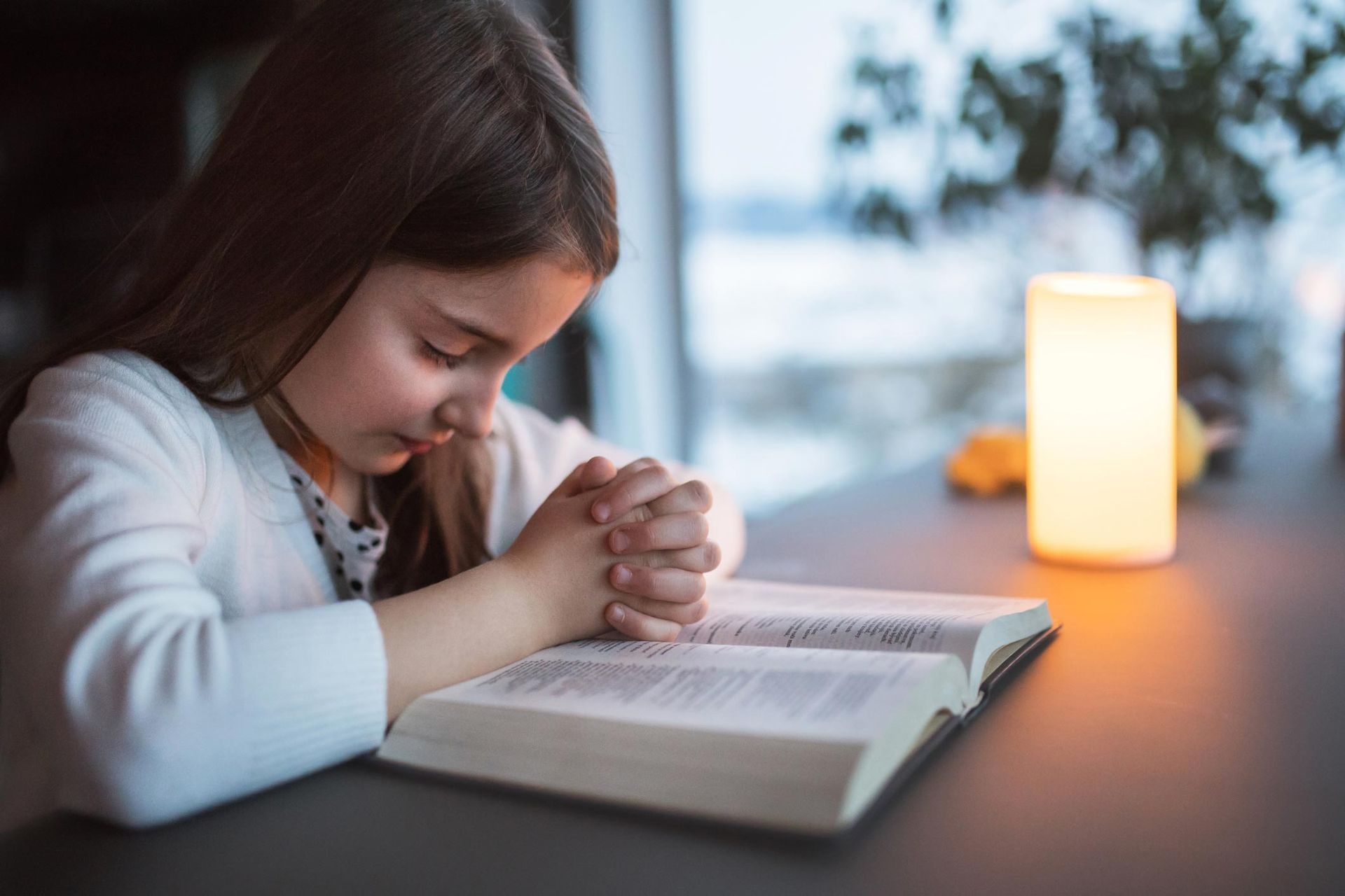 A Small Girl Praying At Home — Corcoran, MN — St John's Evangelical Lutheran