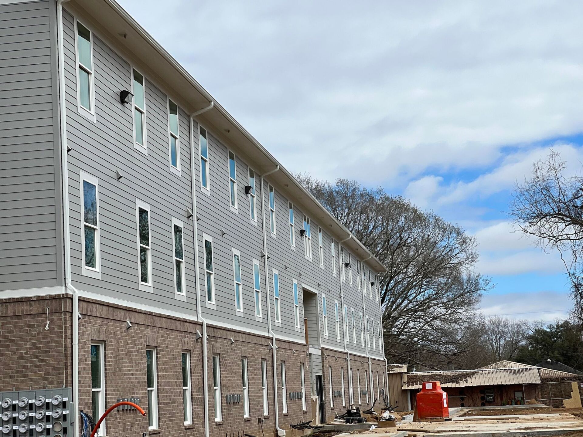 A large building with a lot of windows is under construction