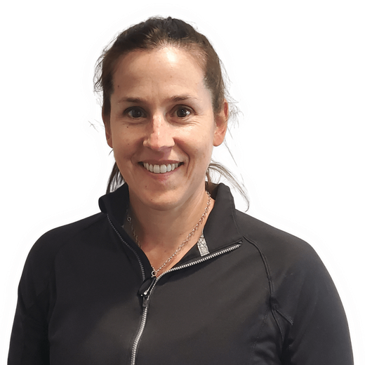 Smiling person in a black zip-up jacket against a white background