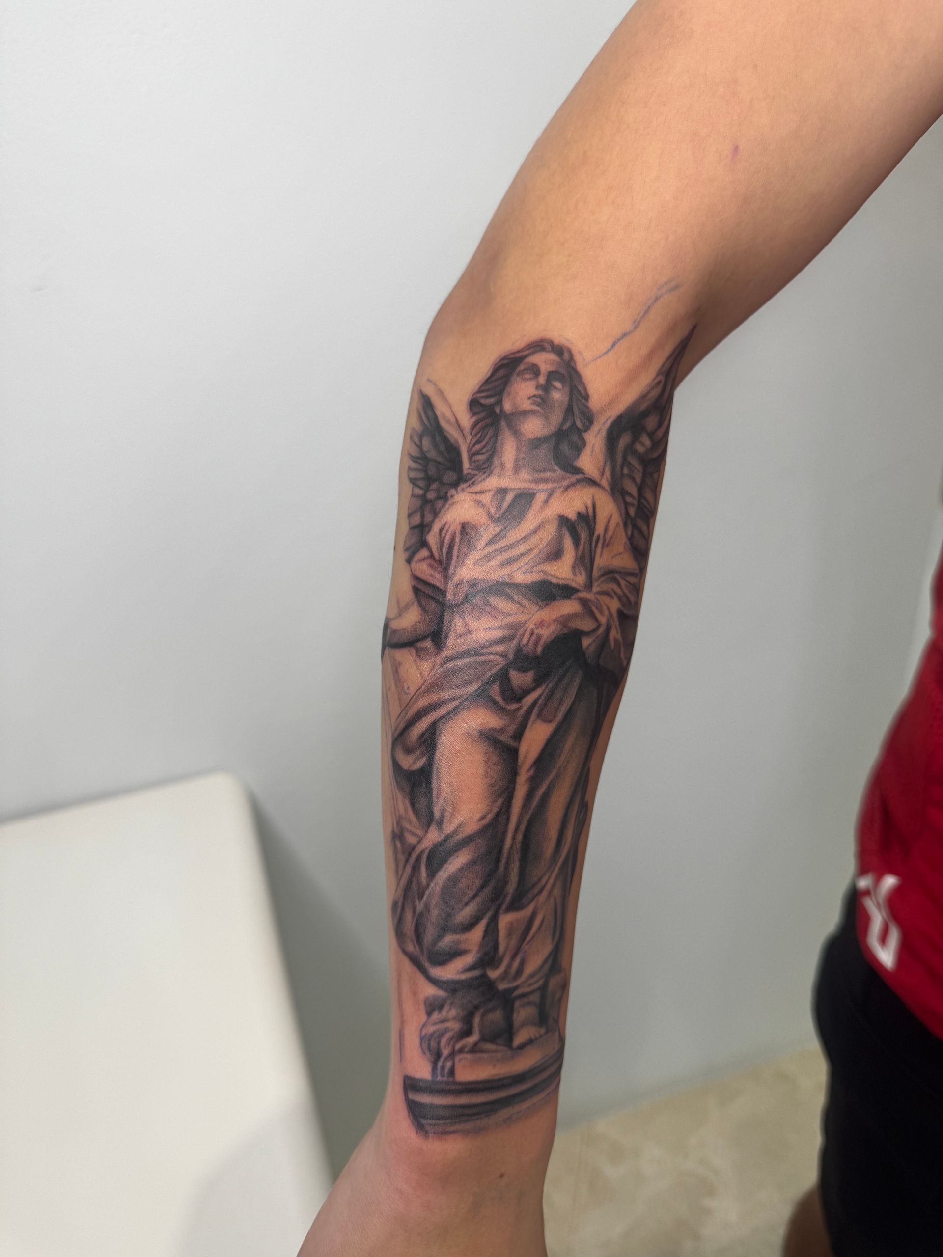 An Arm Tattoo of an Angel  — Tattoo Inc Studio In Broadbeach, QLD