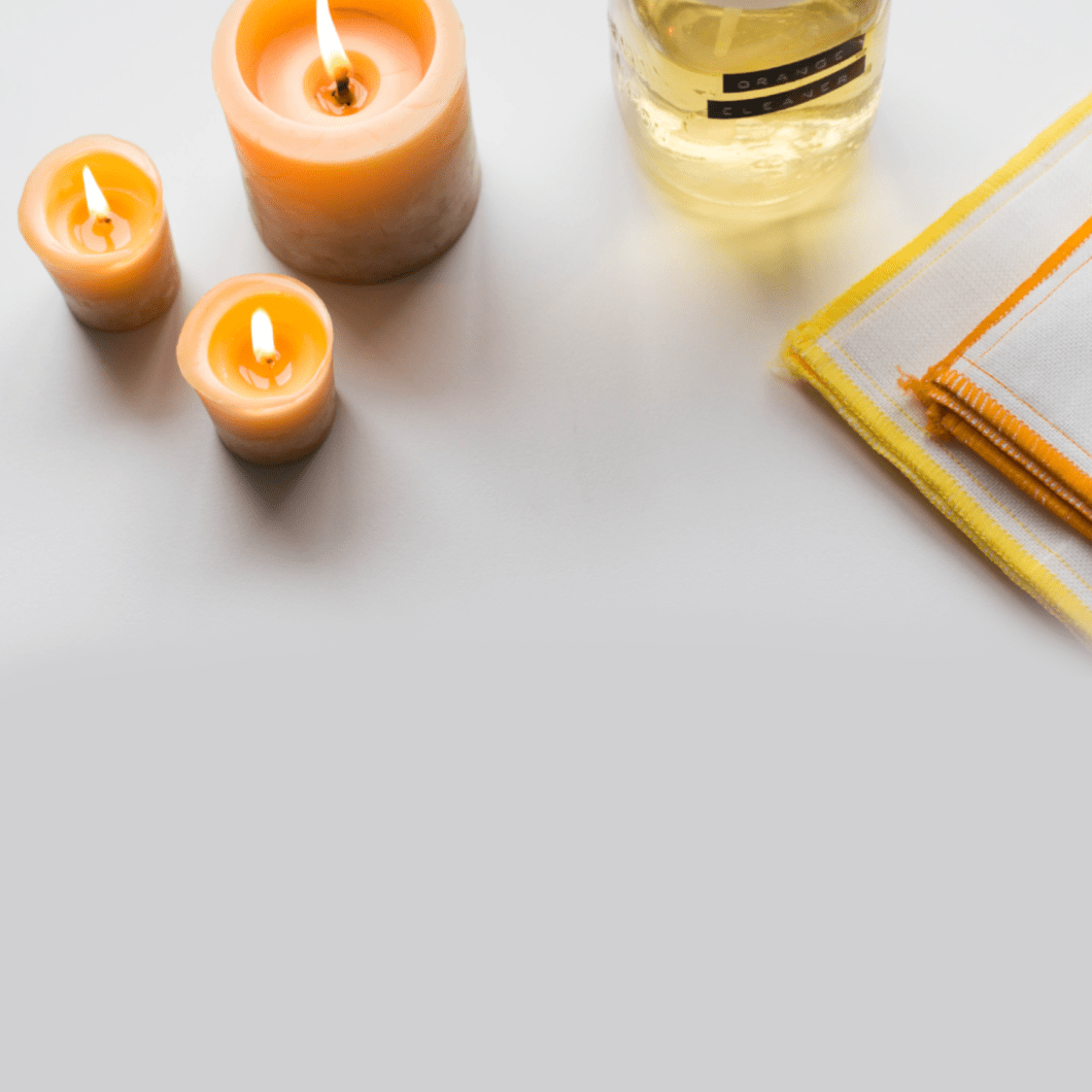 Candles and placemats sit on a table