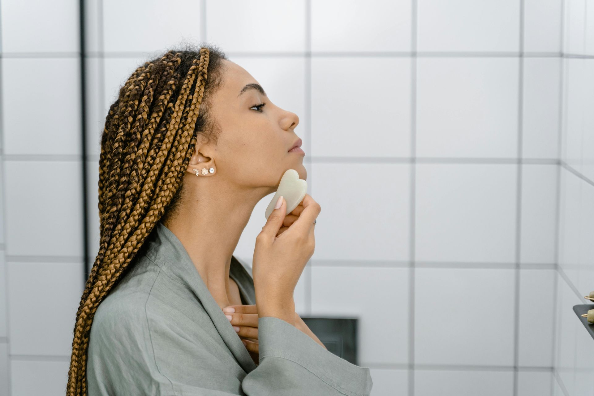 woman using a gua sha