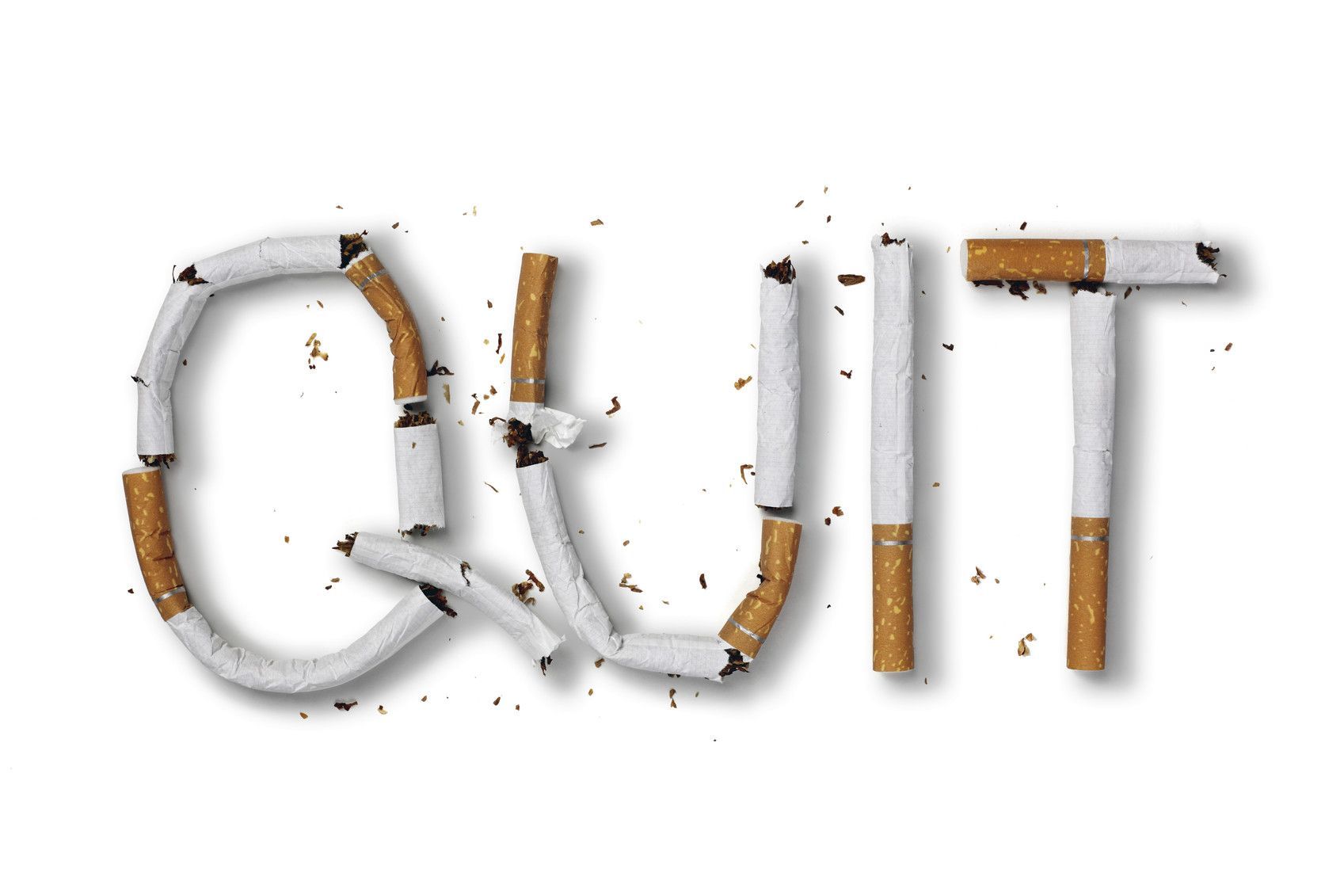 cigarettes arranged to say quit