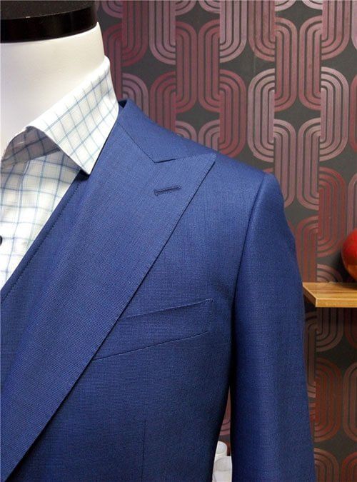 Closer view of blue suit