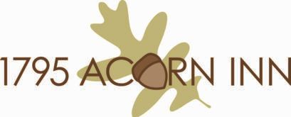 A logo for 1795 acorn inn with acorns and leaves