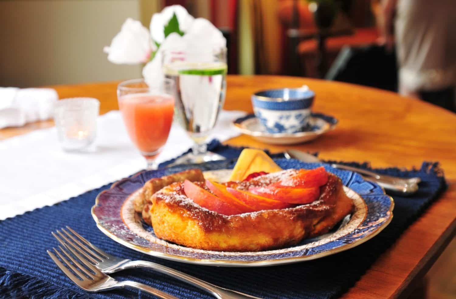 A plate of food on a table with a fork