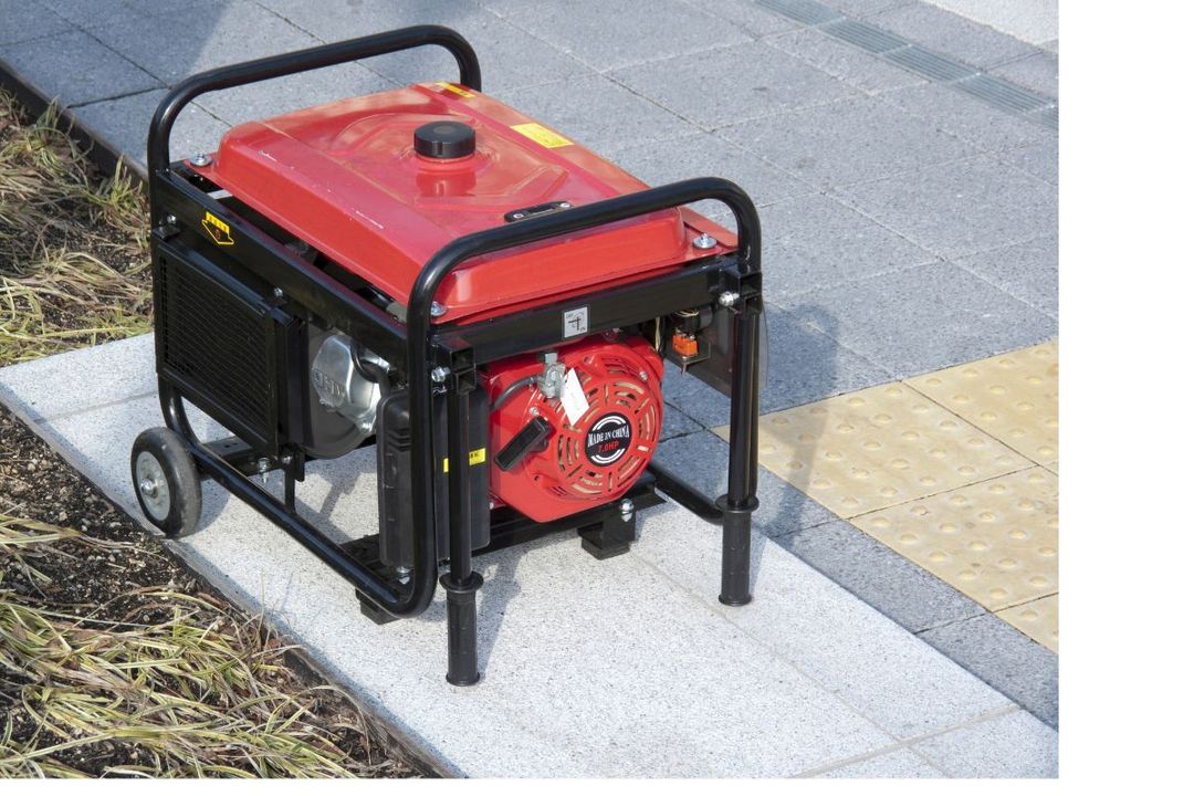 Power supply generator in a yard in tulsa.
