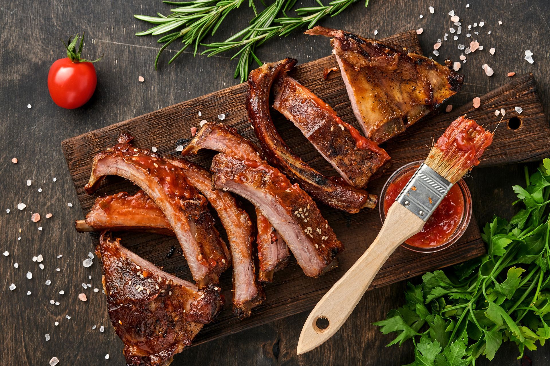 Grilled and smoked pork ribs with barbeque sauce