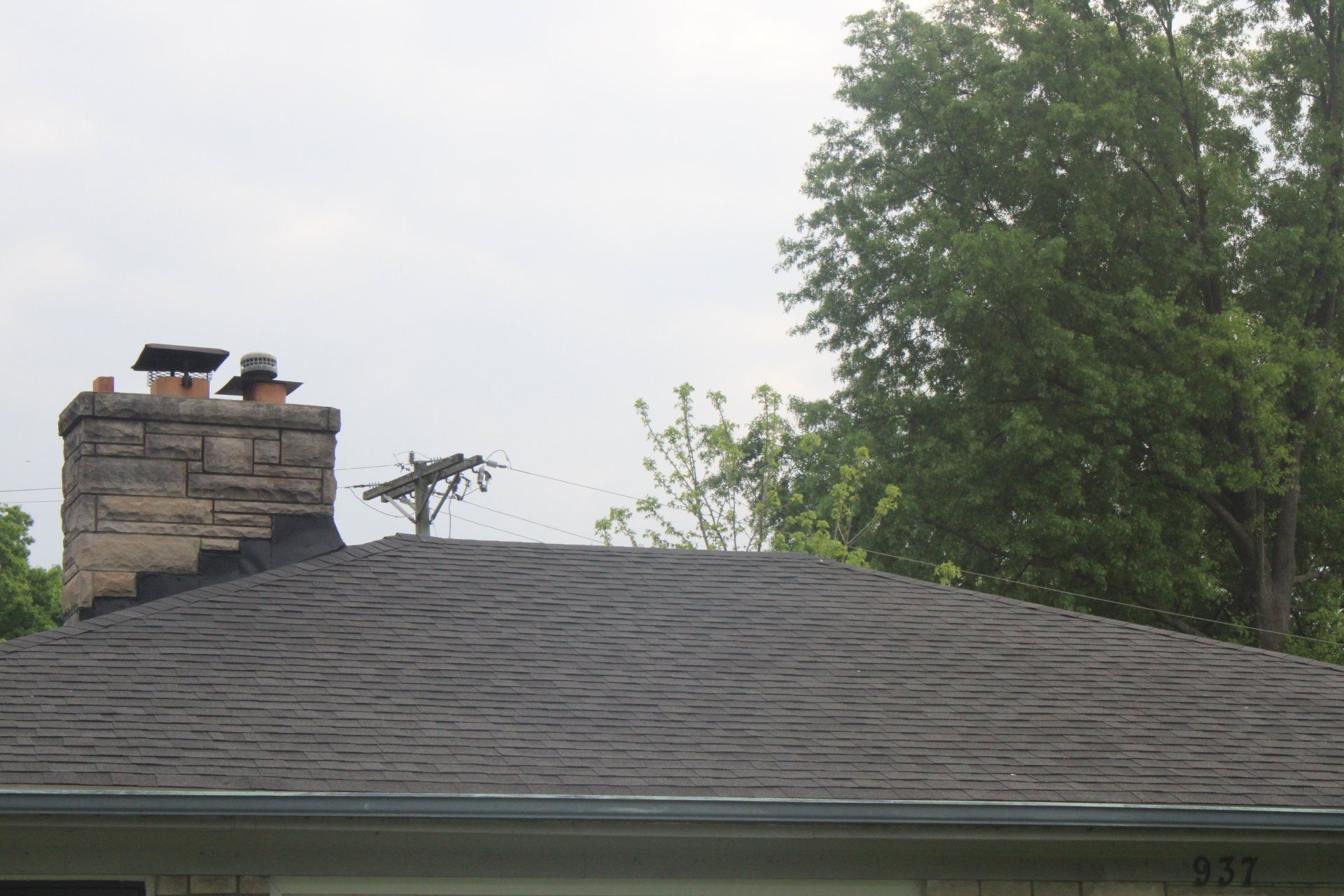 A house with a chimney on top of it