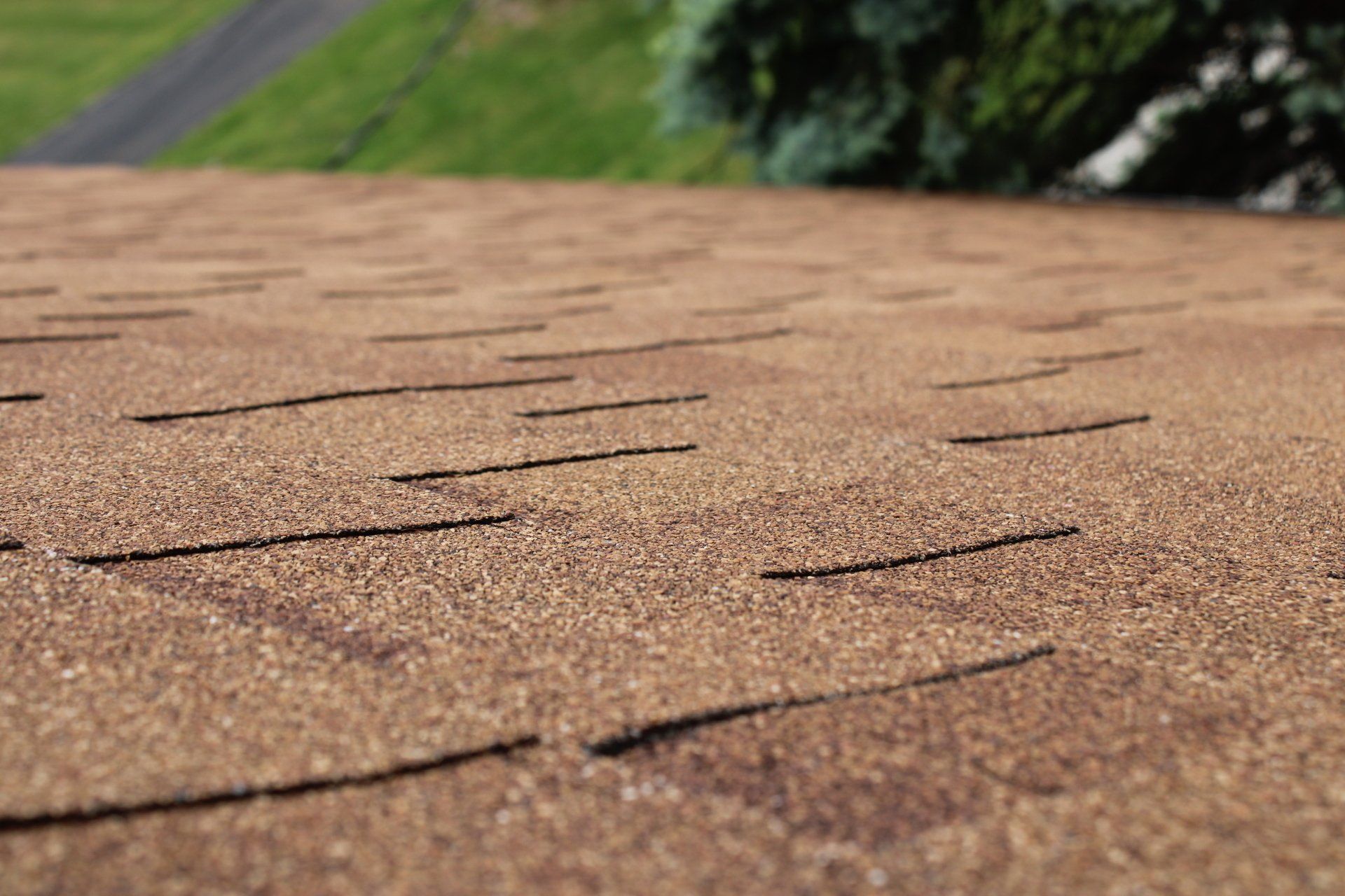 A close up of a roof with shingles on it.