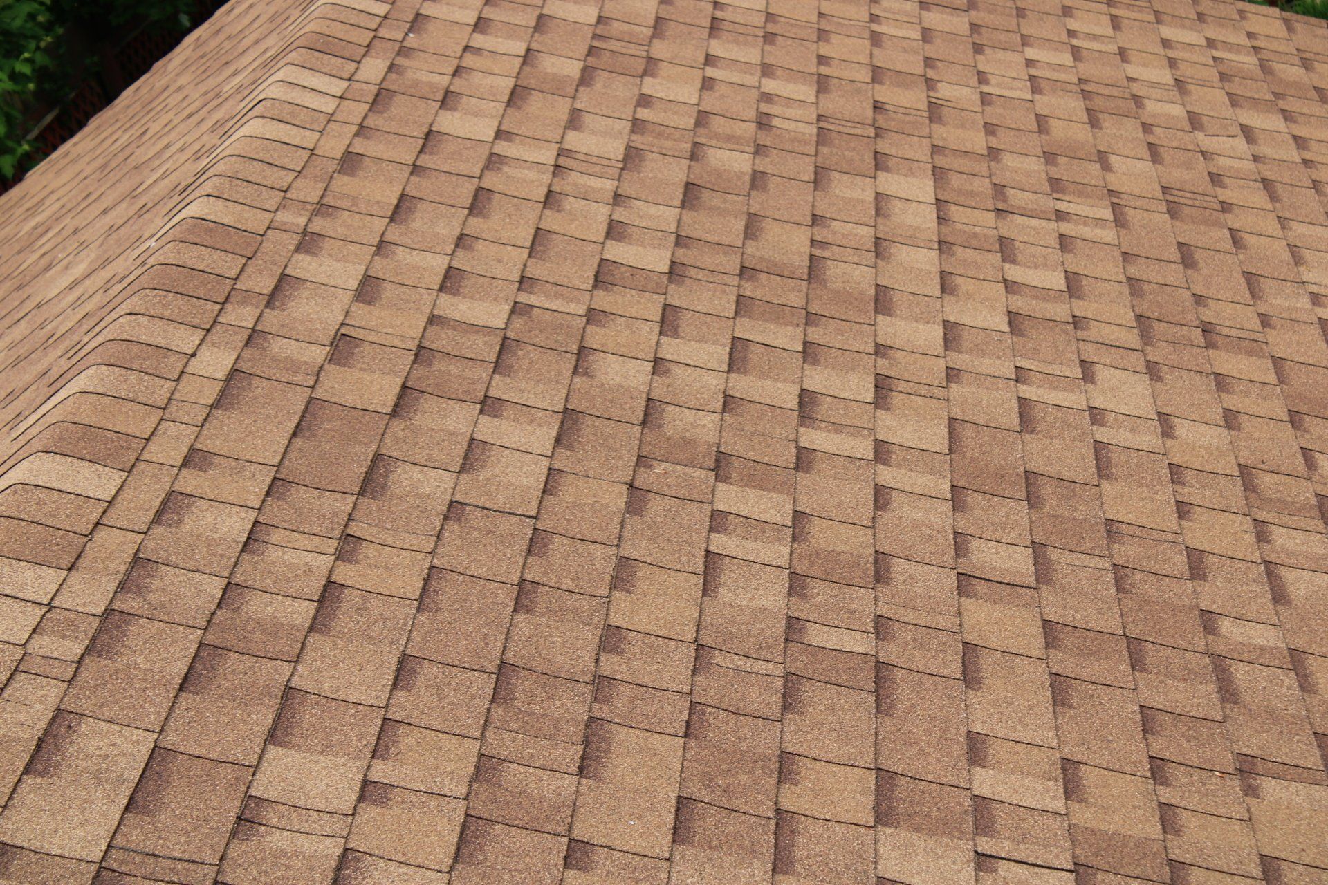 A close up of a roof with shingles on it.