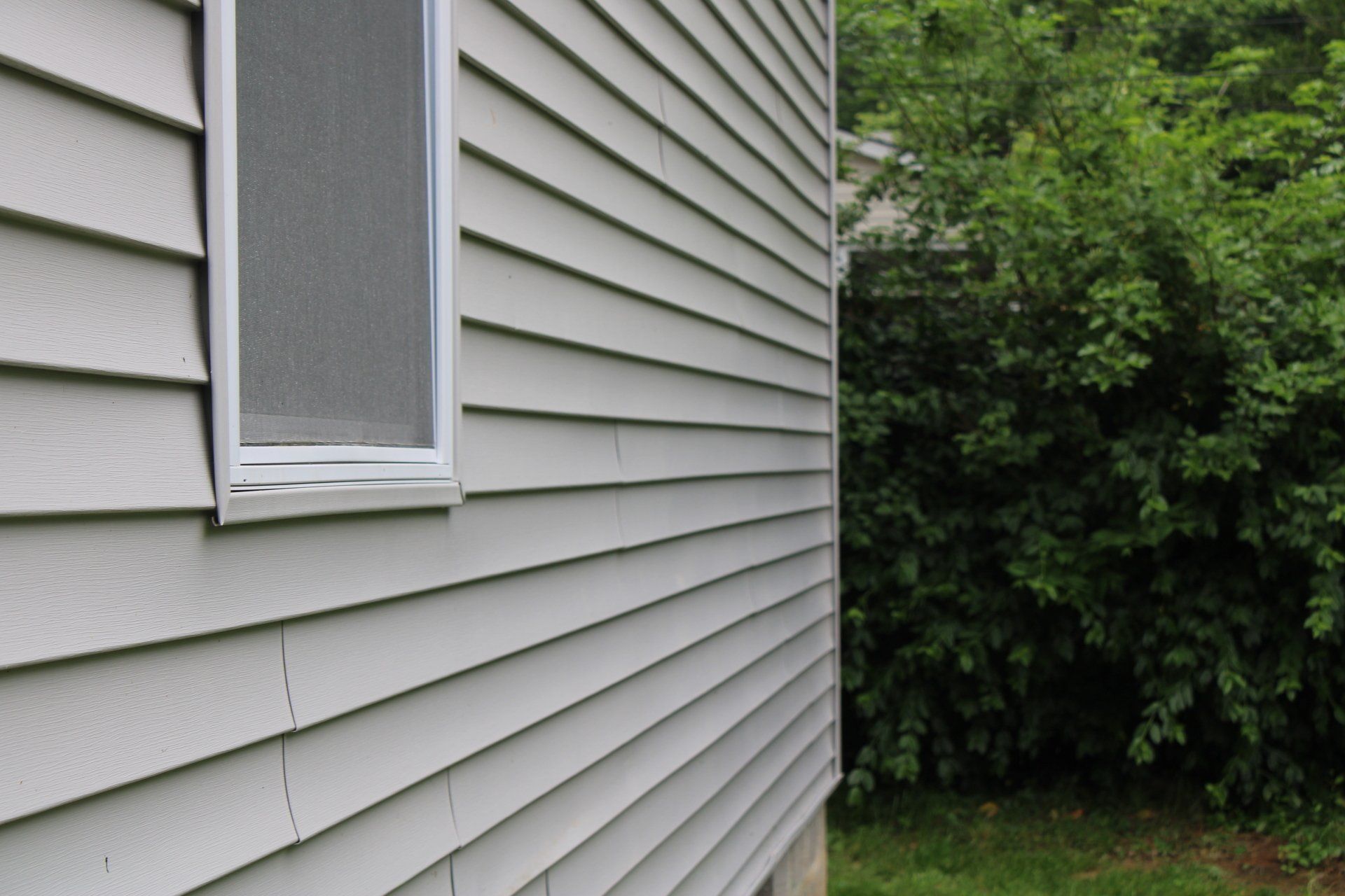 A house with a window on the side of it