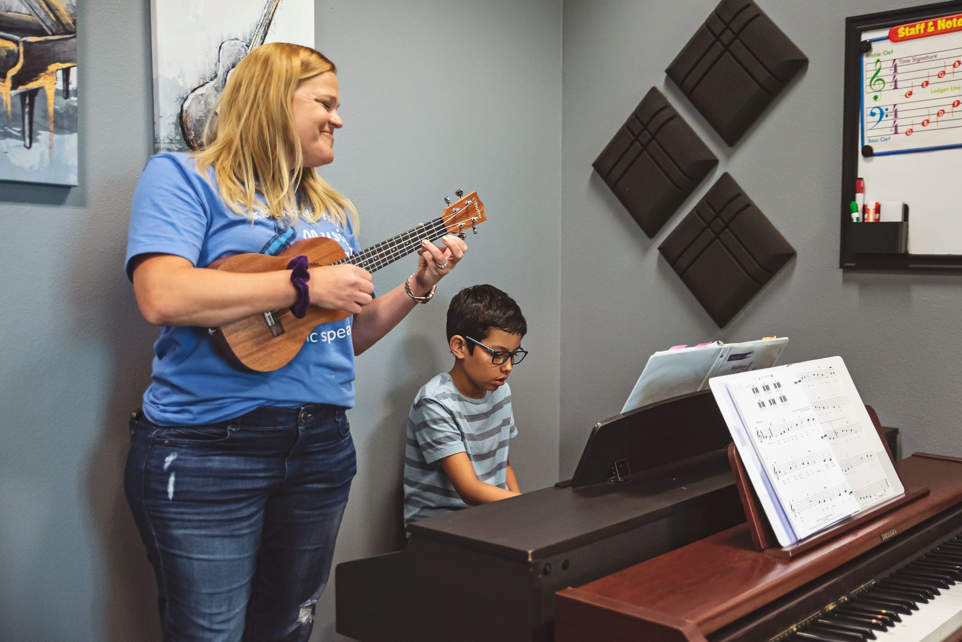piano instructor and student