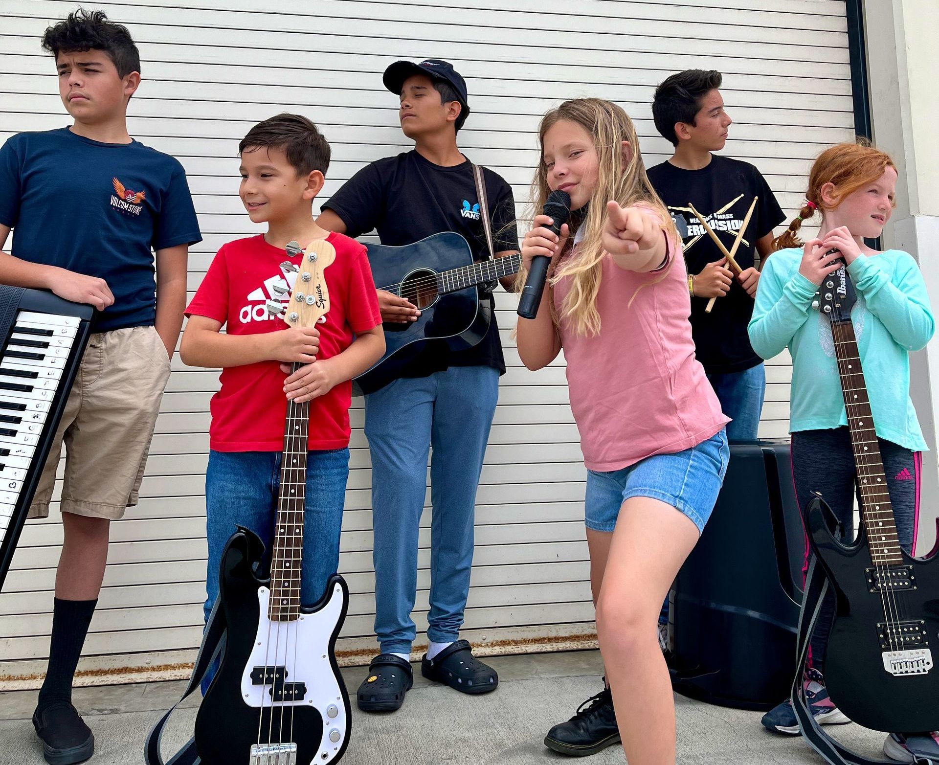 kids rock band with instruments