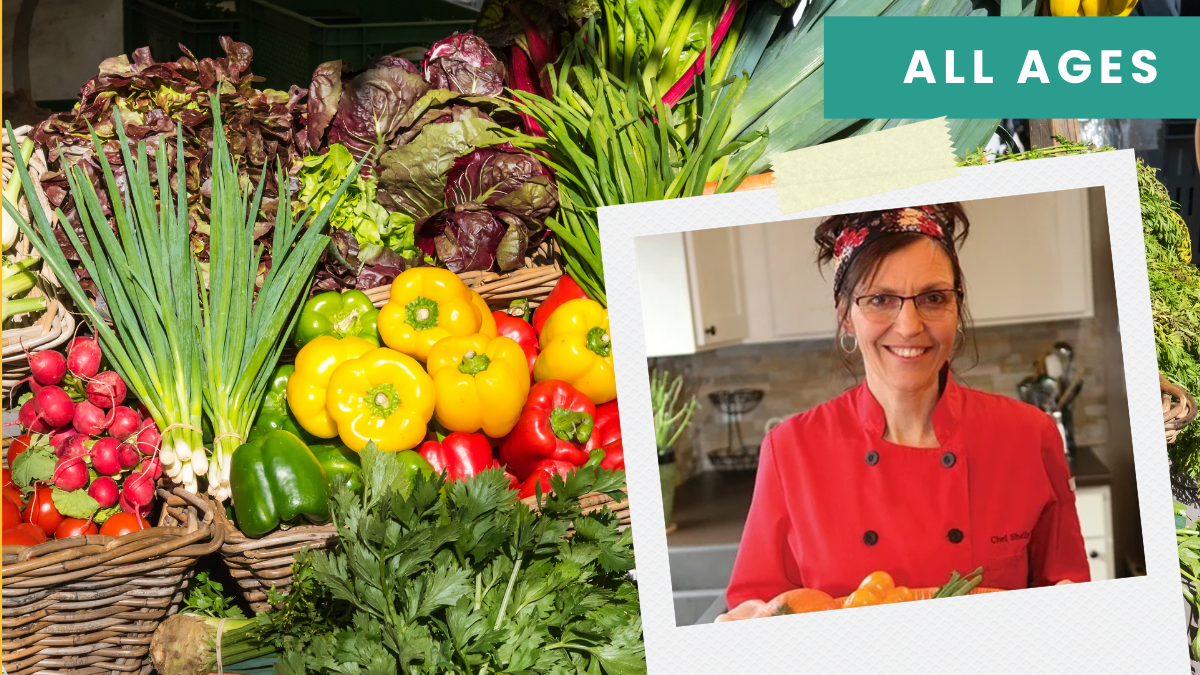 Chef Shell is in a picture in front of a table full of vegetables.