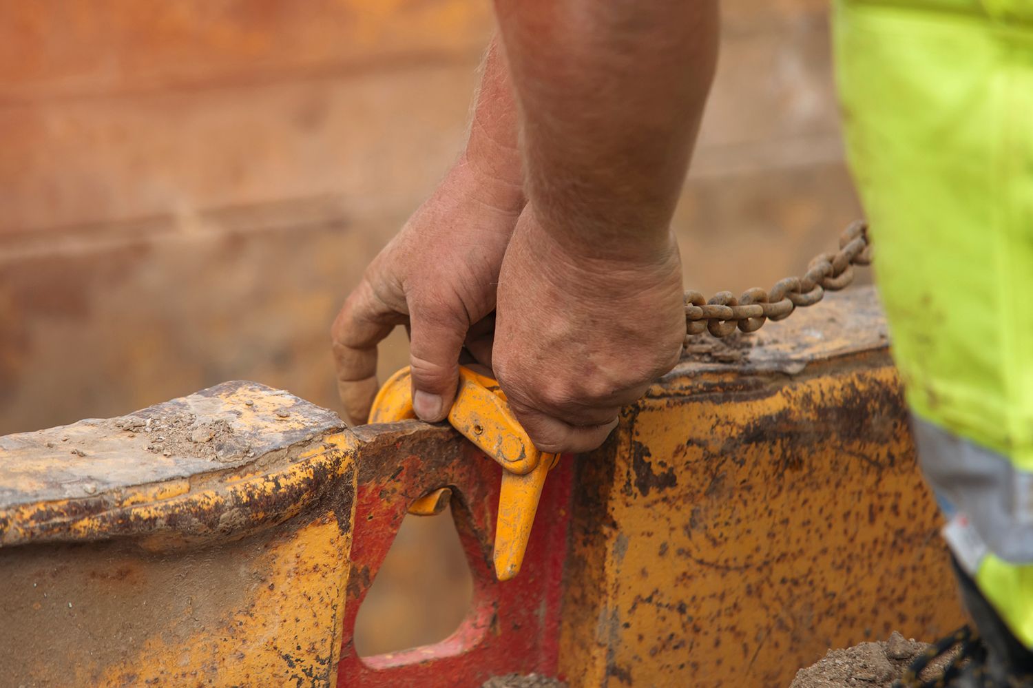 A close up of a person 's hands holding a tool.