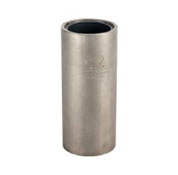 A construction worker is working on a pipe in a trench.