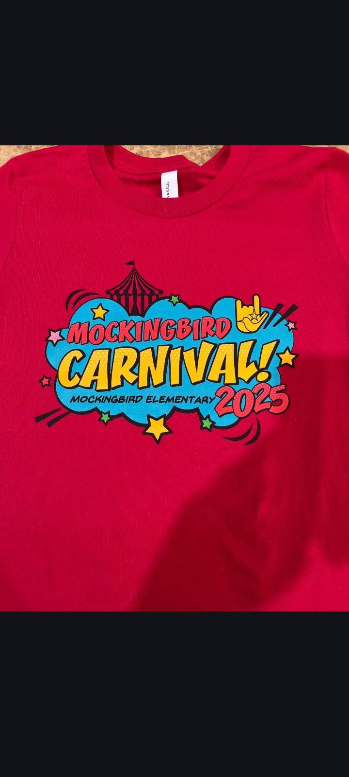Red shirt with a carnival design,