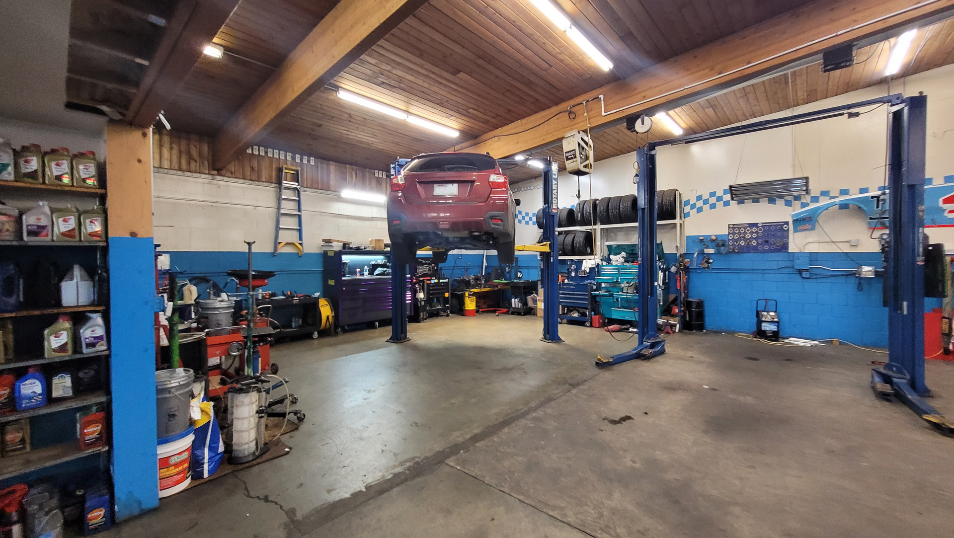 Vehicle on the Lift at Rick's Tire & Service in Seattle, WA