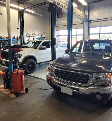 Vehicles Parked in Our Service & Tire Center Waiting for Repair | Rick's Tire & Service
