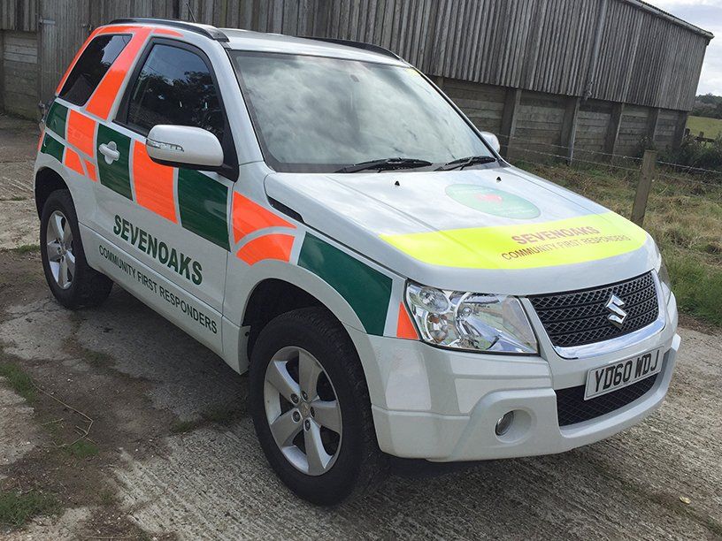 Reflective vinyl graphics for medical vehicle