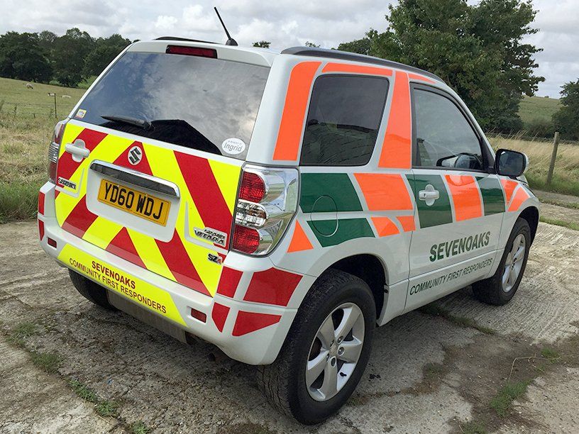 Reflective vinyl graphics for medical vehicle