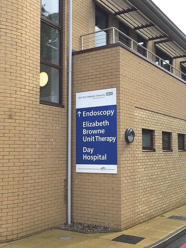 Large wall mounted sign tray for hospital
