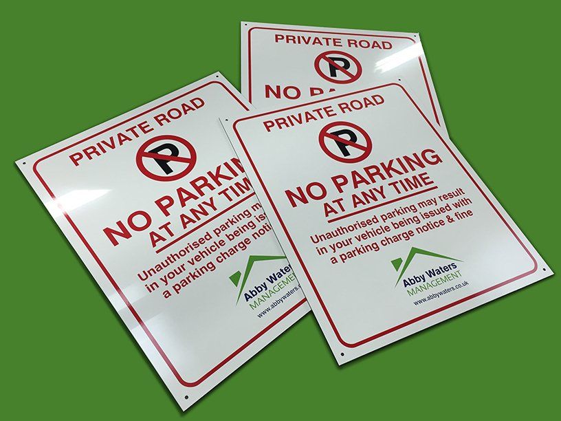 Wall mounted No Parking signs