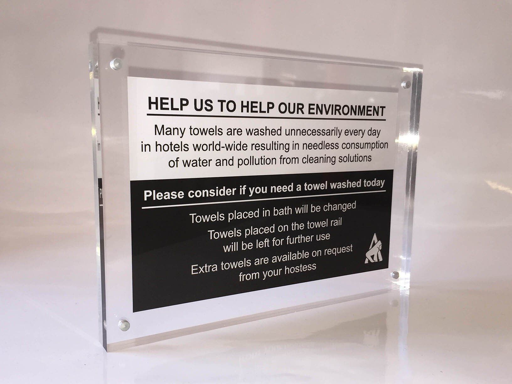 Small acrylic hotel bathroom sign